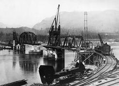 The original Second Narrows Bridge nears completion in the spring of 1925. NVMA 9736