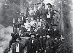 The North Vancouver mountains have always been a destination for urbanites in search of wilderness recreation. This group of hikers poses near the top of Grouse Mountain in 1906. NVMA 55