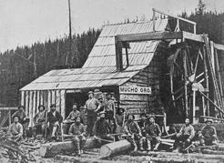 A severe shortage of white women in British Columbia meant that partnering with an Indigenous woman was the only option for most miners, like these photographed at the Mucho Oro claim at Stouts Gulch ca. 1868. Image A-00613 courtesy of the Royal BC Museum.