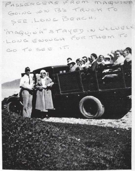 Two people stand in front of a truck. In the back of the truck is a wooden compartment holding a group of people. Text: Passengers from Maquina going on B's truck to see Long Beach. "Maquina" stayed in Ucluelet long enough for them to go see it. 