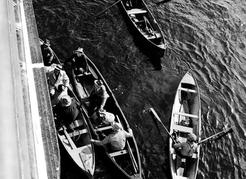 Rowboats await their turn to load passengers and goods at the side of the Princess Maquinna off Clo-oose. Image 27596_142 courtesy of the Royal BC Museum.