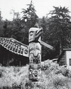 A carving of a bird with wings outstretched