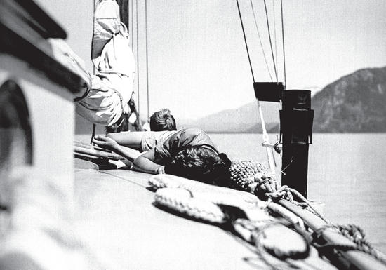 One or two of the children napping in the sun onboard the Caprice