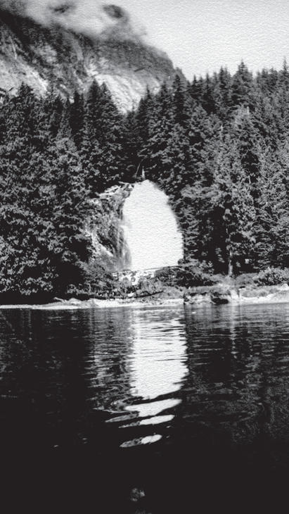 A waterfall across a lake