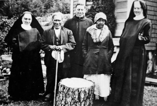 Mid-1930s, Chief Joseph and Queen Mary at Opitsat with unidentified Roman Catholic sisters and priest.