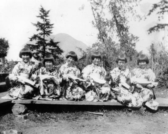 March 3, 1928, Japanese girls at Clayoquot celebrating the annual Hina Matsuru, or Doll Festival, also called Girls’ Day. All are in traditional kimonos, holding their valued dolls, with Lone Cone in the background.