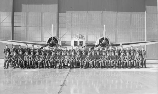Aircrew of No. 147 Bomber Reconnaissance Squadron pose in front of one of their Bolingbroke Bombers at the Tofino RCAF Station in 1944.