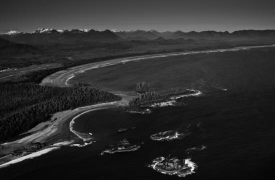 The beaches of Clayoquot Sound, including Long Beach, seen here with the Estevan Coastal Plain lying behind, consist of debris from the last ice age 10,000 to 12,000 years ago. Waves ground the material into long, sandy beaches.