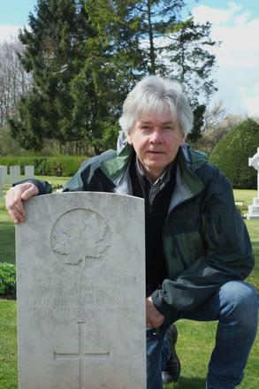 Greg Dickson at the grave of his great uncle Theo Dickson in Wiltshire
