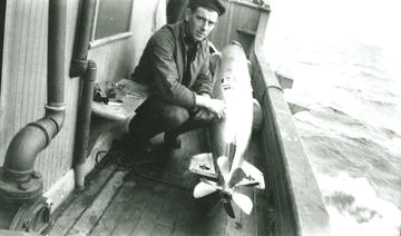 man with fish-shaped torpedo