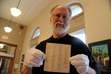 Nelson historian Greg Scott with list of Anglican church members who fought in World War I