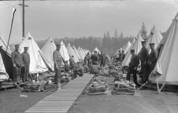 Men gathered for drills in Hastings Park in Vancouver.