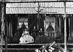 German dancing girls, known as hurdy-gurdies, Barkerville, 1865. They provided dances for a fee, but often were forced into sex. BC Archives G-00817