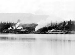 Lumber being loaded on a ship at Chemainus Sawmill in the&#160;1890s. Image E-08040 courtesy of the Royal BC Museum and&#160;Archives.