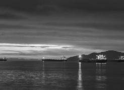 Freighters in English Bay, waiting to dock in the port of Vancouver. Waste spilled accidentally or intentionally from ships has been a contentious&#160;issue. David Nunuk&#160;photo